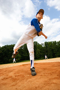 Young boy throwing a baseball
