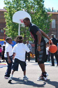 Chris Paul playing basketball with kids