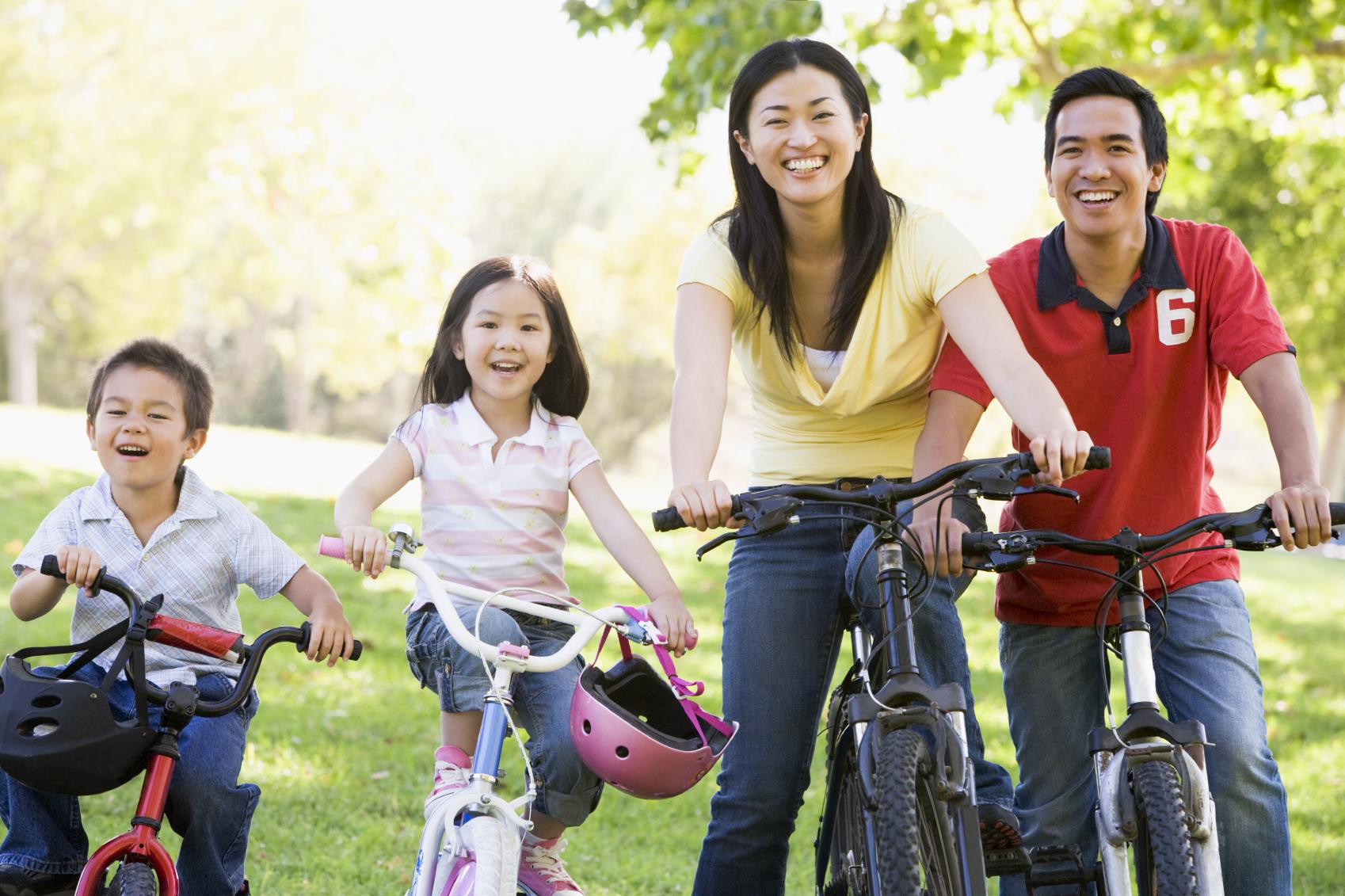 Asian Family on Bikes