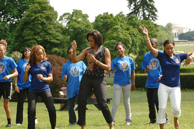 The First Lady exercises on teh White House lawn