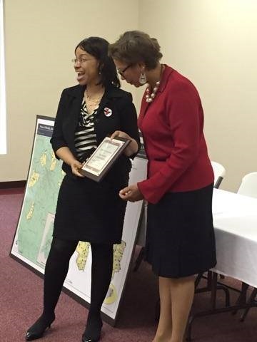 Sharon Ricks presenting award to Cheryl Emanuel in February 2016