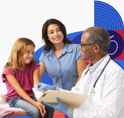 A smiling doctor holding medical records and talking with a child and the child’s mother. 