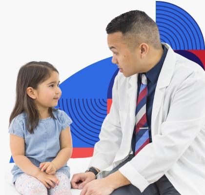 Health care provider talking with young girl