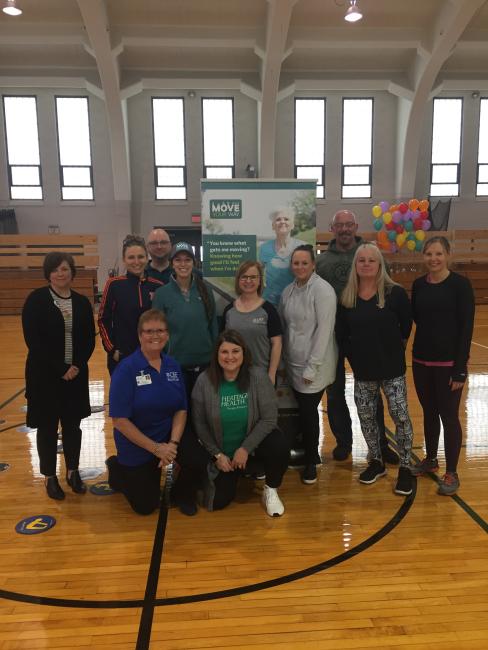 The Live Well Streator team in Streator, Illinois, pose for a photo at their Move Your Way launch event.
