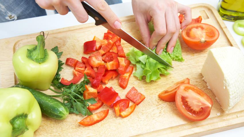 Person chopping vegetables 